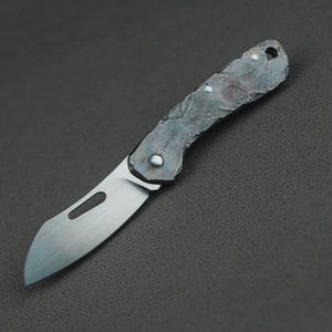 Time honored sculpture-Folding knife with rock texture and titanium alloy handle