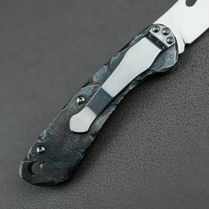 Time honored sculpture-Folding knife with rock texture and titanium alloy handle